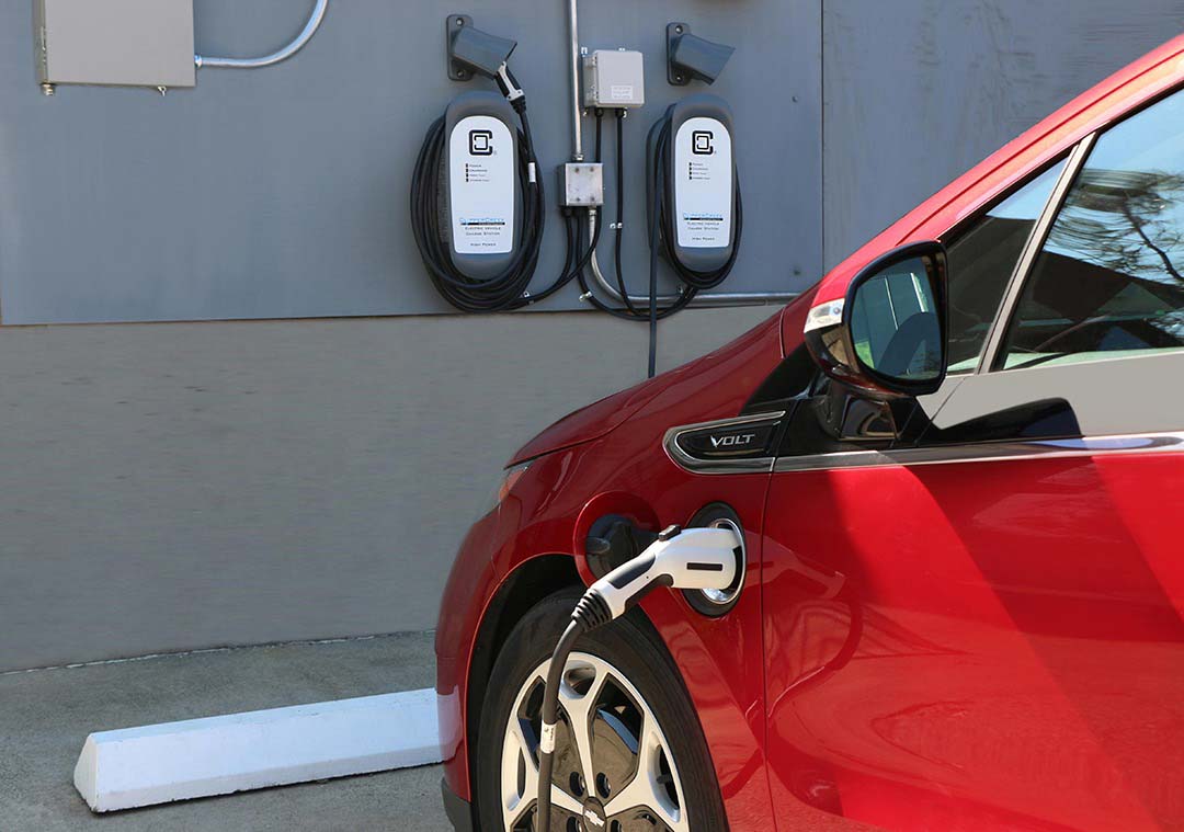 COSMOS Charging red Chevy Volt with ClipperCreek electric car charging station