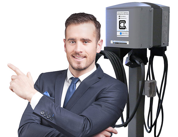 handsome smiling business man pointing and posing next to workplace clippercreek charger