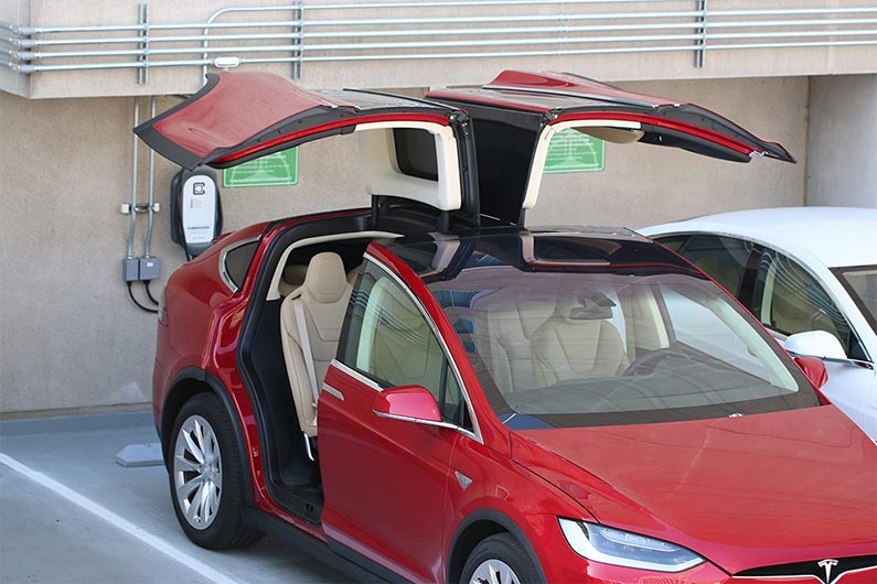 Model X plugged into level 2 charging station