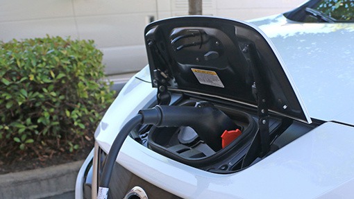 Locked EV Charge Inlet Charging White Nissan Leaf