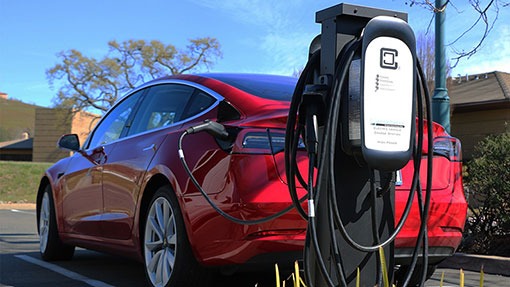 2019 Tesla Model 3 Red Charging Up with ClipperCreek HCS EV Charging Station Pedestal Mount